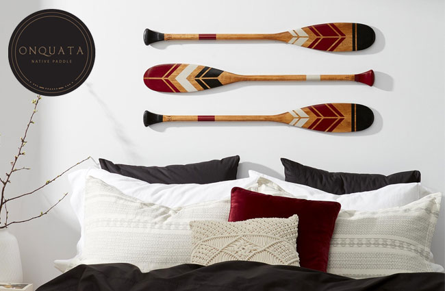 Hand painted paddles inspired by First Nations culture.