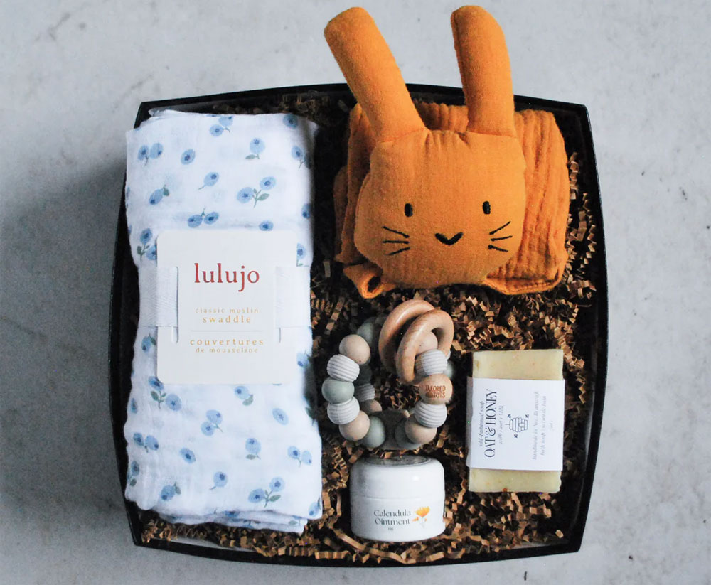 Baby box full of products who makes good baby shower gift ideas